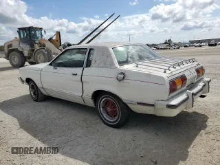 1977 Ford Mustang z VIN 7F04Z150204, wystawiony jako Copart lot #77276344 z przebiegiem 94 802 mil mil oraz Szkoda całkowita • Salvage title. Historia ofert i sprzedaży dostępna na DreamBid. Obrazek 2.