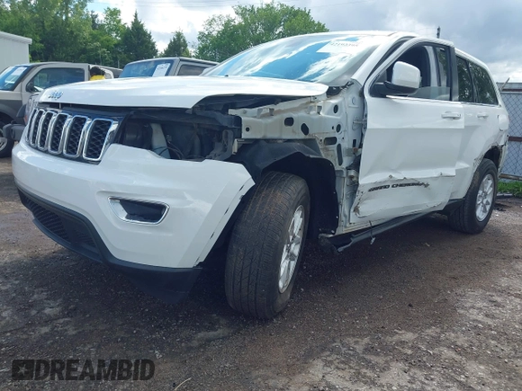 2018 Jeep Grand Cherokee Altitude with VIN 1C4RJEAGXJC171254, listed as a IAAI auction lot 42192395 with 210,890 mi miles and . Bid and sale history available at DreamBid. Image 2.