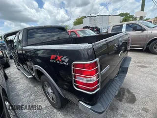 2005 Ford F-150 XLT with VIN 1FTPX14585NA13563, listed as a Copart auction lot 63709515 with 248,403 mi miles and Clean title. Bid and sale history available at DreamBid. Image 3.