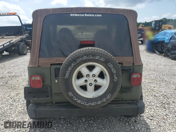 1998 Jeep Wrangler SE with VIN 1J4FY29P8WP784825, listed as a Copart auction lot 61581205 with 148,152 mi miles and Clean title. Bid and sale history available at DreamBid. Image 6.