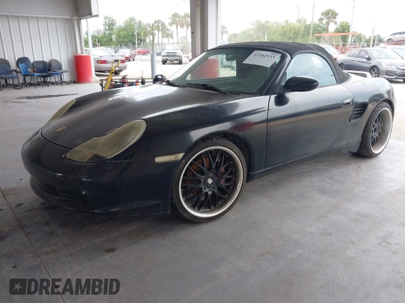 2003 Porsche Boxster с VIN WP0CA29893U620342, выставлен на аукционе IAAI как лот 42202533 с пробегом 141 397 миль миль и . История ставок и продаж доступна на DreamBid. Изображение 2.