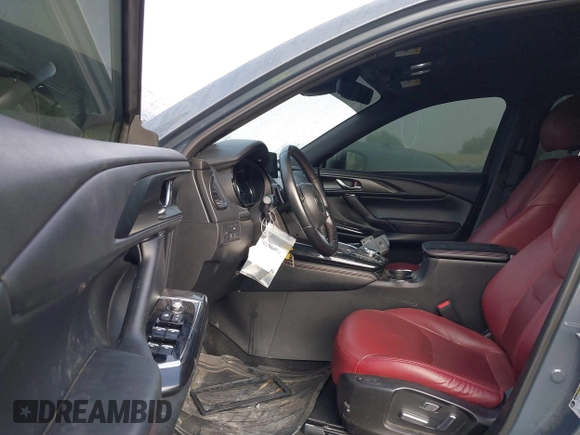 2021 Mazda CX-9 Grand Touring with VIN JM3TCADY1M0519288, listed as a IAAI auction lot 41186094 with 50,701 mi miles and . Bid and sale history available at DreamBid. Image 5.