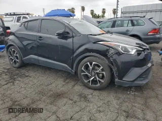 2019 Toyota C-HR XLE z VIN JTNKHMBX8K1055954, wystawiony jako Copart lot #53290965 z przebiegiem 63 265 mil mil oraz Szkoda całkowita • Salvage title. Historia ofert i sprzedaży dostępna na DreamBid. Obrazek 4.