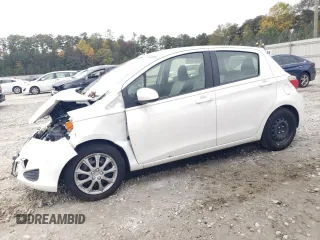2012 Toyota Yaris L with VIN JTDKTUD30CD528470, listed as a Copart auction lot 79952414 with 157,062 mi miles and Salvage Title. Bid and sale history available at DreamBid. Image 1.