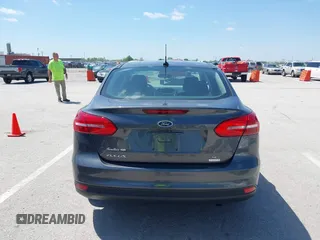 2018 Ford Focus SE z VIN 1FADP3FE6JL223294, wystawiony jako IAAI lot #42067973 z przebiegiem 74 734 mil mil oraz . Historia ofert i sprzedaży dostępna na DreamBid. Obrazek 16.