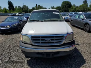 2002 Ford F-150 XL with VIN 1FTRX17L42NB56461, listed as a Copart auction lot 59988885 with 244,057 mi miles and Clean title. Bid and sale history available at DreamBid. Image 5.