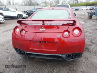 2015 Nissan GT-R Premium z VIN JN1AR5EFXFM280227, wystawiony jako IAAI lot #41920650 z przebiegiem 79 140 mil mil oraz . Historia ofert i sprzedaży dostępna na DreamBid. Obrazek 17.