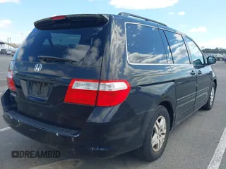 2006 Honda Odyssey EX-L z VIN 5FNRL387X6B055048, wystawiony jako IAAI lot #41974961 z przebiegiem 123 361 mil mil oraz . Historia ofert i sprzedaży dostępna na DreamBid. Obrazek 4.