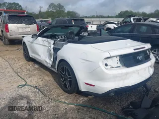 2022 Ford Mustang EcoBoost z VIN 1FATP8UHXN5124073, wystawiony jako IAAI lot #41844813 z przebiegiem 63 425 mil mil oraz . Historia ofert i sprzedaży dostępna na DreamBid. Obrazek 3.