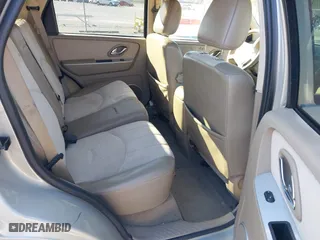 2006 Mercury Mariner Luxury with VIN 4M2CU56156DJ05613, listed as a IAAI auction lot 41305481 with 164,896 mi miles. Bid and sale history available at carsss.com. Image 8.