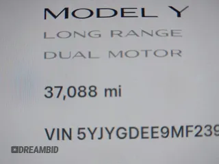 2021 Tesla Model Y Long Range with VIN 5YJYGDEE9MF239726, listed as a IAAI auction lot 41952158 with 37,088 mi miles and . Bid and sale history available at DreamBid. Image 16.