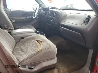 1999 Ford F-150 XL z VIN 1FTRX18L8XKC14644, wystawiony jako Copart lot #53959095 z przebiegiem Nie podano mil oraz Szkoda całkowita • Salvage title. Historia ofert i sprzedaży dostępna na DreamBid. Obrazek 7.