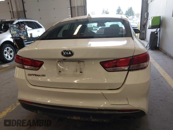 2016 Kia Optima LX with VIN KNAGT4L39G5074319, listed as a IAAI auction lot 41827438 with 51,373 mi miles. Bid and sale history available at carsss.com. Image 16.