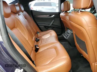 2015 Maserati Ghibli S Q4 z VIN ZAM57RTA1F1161983, wystawiony jako Copart lot #54793155 z przebiegiem 102 487 mil mil oraz Tytuł czysty. Historia ofert i sprzedaży dostępna na DreamBid. Obrazek 10.