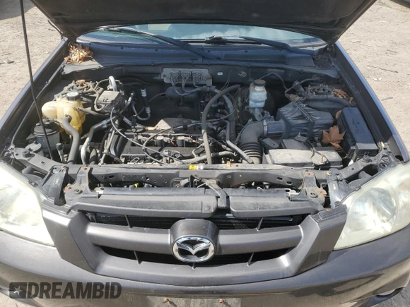 2006 Mazda Tribute i with VIN 4F2YZ92Z76KM26192, listed as a Copart auction lot 50412865 with 152,851 mi miles and Salvage Title. Bid and sale history available at carsss.com. Image 13.