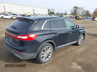 2016 Lincoln MKX Reserve with VIN 2LMTJ8LP3GBL71597, listed as a IAAI auction lot 40722178 with 230,704 mi miles. Bid and sale history available at carsss.com. Image 4.