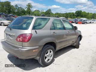 1999 Lexus RX 300 with VIN JT6GF10UXX0033370, listed as a IAAI auction lot 42115674 with 149,879 mi miles and . Bid and sale history available at DreamBid. Image 4.