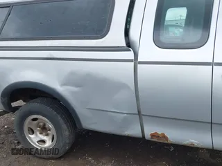2002 Ford F-150 XL с VIN 1FTRX18L52NB18963, выставлен на аукционе IAAI как лот 42042014 с пробегом 229 262 миль миль и . История ставок и продаж доступна на DreamBid. Изображение 6.
