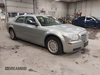 2005 Chrysler 300 with VIN 2C3JA43R55H569369, listed as a IAAI auction lot 41132751 with 123,253 mi miles. Bid and sale history available at carsss.com. Image 1.