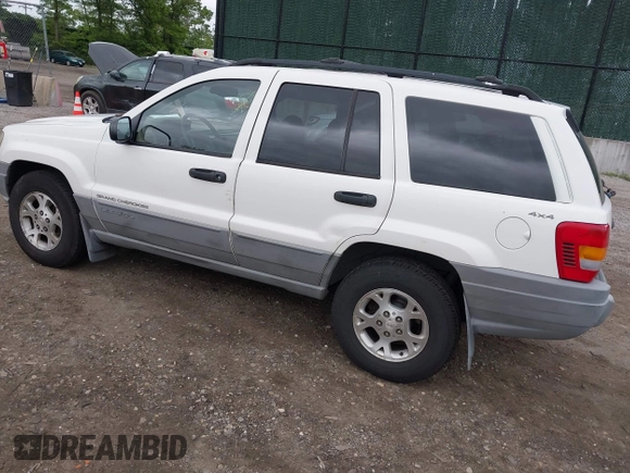 2000 Jeep Grand Cherokee Laredo z VIN 1J4GW48S2YC390226, wystawiony jako IAAI lot #42326715 z przebiegiem 273 806 mil mil oraz . Historia ofert i sprzedaży dostępna na DreamBid. Obrazek 3.