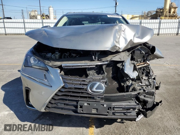 2021 Lexus NX 300 with VIN JTJGARBZ7M2191564, listed as a Copart auction lot 57974155 with 52,499 mi miles and Salvage title. Bid and sale history available at DreamBid. Image 5.