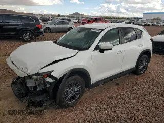 2021 Mazda CX-5 Touring z VIN JM3KFBCM3M0339091, wystawiony jako Copart lot #45538585 z przebiegiem 67 344 mil mil oraz Szkody całkowita. Historia ofert i sprzedaży dostępna na DreamBid. Obrazek 1.