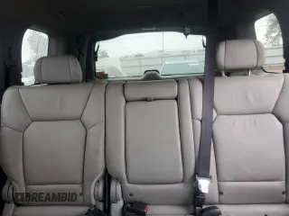 2011 Honda Pilot Touring z VIN 5FNYF4H94BB046303, wystawiony jako Copart lot #58017515 z przebiegiem 118 384 mil mil oraz Szkoda całkowita • Salvage title. Historia ofert i sprzedaży dostępna na DreamBid. Obrazek 10.