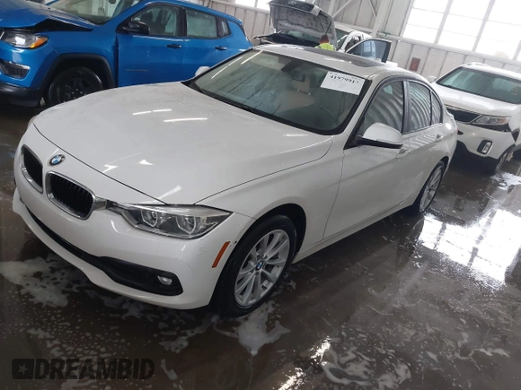 2018 BMW 3 Series 320i with VIN WBA8A9C57JAH13937, listed as a IAAI auction lot 41979917 with 268,115 mi miles. Bid and sale history available at carsss.com. Image 2.