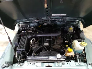 1999 Jeep Wrangler Sport with VIN 1J4FY19S8XP490177, listed as a Copart auction lot 46136045 with 243,883 mi miles and Salvage Title. Bid and sale history available at carsss.com. Image 11.
