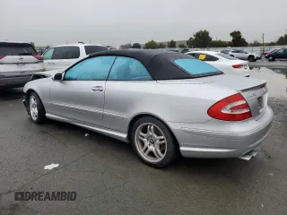 2004 Mercedes-Benz CLK 55 AMG with VIN WDBTK76G44T021103, listed as a Copart auction lot 84726784 with 77,565 mi miles and Salvage Title. Bid and sale history available at DreamBid. Image 2.