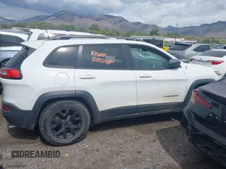 2018 Jeep Cherokee Trailhawk with VIN 1C4PJMBX3JD548761, listed as a IAAI auction lot 42107376 with 148,525 mi miles and . Bid and sale history available at DreamBid. Image 12.