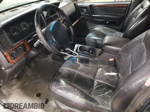 1997 Jeep Grand Cherokee Limited with VIN 1J4GZ78Y3VC733618, listed as a Copart auction lot 53757095 with 150,806 mi miles and Salvage title. Bid and sale history available at DreamBid. Image 7.
