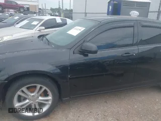 2014 Dodge Avenger SE with VIN 1C3CDZAB2EN229221, listed as a IAAI auction lot 42632298 with 163,229 mi miles and . Bid and sale history available at DreamBid. Image 6.