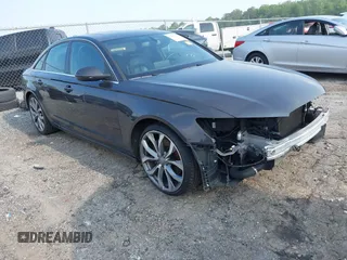 2014 Audi A6 Premium Plus z VIN WAUGFAFC4EN040965, wystawiony jako IAAI lot #42389149 z przebiegiem 98 829 mil mil oraz . Historia ofert i sprzedaży dostępna na DreamBid. Obrazek 1.