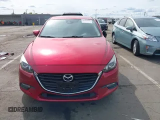 2017 Mazda 3 Touring with VIN 3MZBN1V79HM129043, listed as a IAAI auction lot 41970009 with 142,654 mi miles and . Bid and sale history available at DreamBid. Image 12.