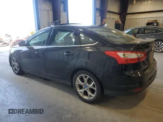 2013 Ford Focus Titanium with VIN 1FADP3J29DL193550, listed as a Copart auction lot 48848985 with 159,294 mi miles and Salvage Title. Bid and sale history available at carsss.com. Image 2.