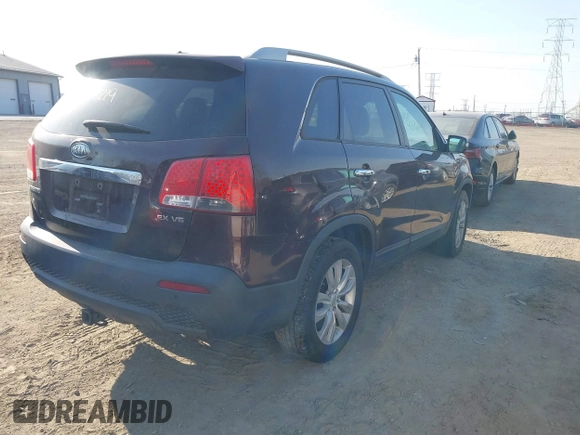 2011 Kia Sorento EX with VIN 5XYKU4A20BG153415, listed as a IAAI auction lot 41768219 with 185,732 mi miles. Bid and sale history available at carsss.com. Image 4.