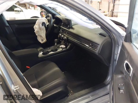 2023 Honda Civic Sport with VIN 19XFL2H80PE010679, listed as a IAAI auction lot 42026973 with 25,701 mi miles and . Bid and sale history available at DreamBid. Image 5.