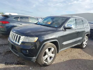 2013 Jeep Grand Cherokee Overland with VIN 1C4RJECT2DC546634, listed as a IAAI auction lot 41180807 with 111,897 mi miles. Bid and sale history available at carsss.com. Image 2.