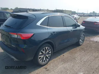 2022 Ford Escape Titanium with VIN 1FMCU9J93NUB50196, listed as a IAAI auction lot 42420209 with 22,210 mi miles and . Bid and sale history available at DreamBid. Image 4.