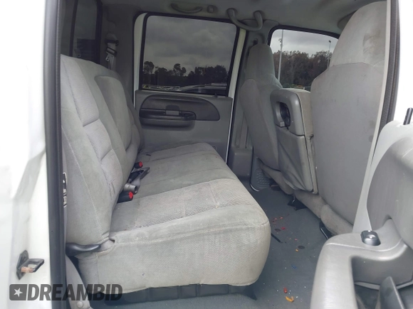 2003 Ford F-350 XL z VIN 1FTSW31P53ED77760, wystawiony jako IAAI lot #41656643 z przebiegiem 176 489 mil mil oraz . Historia ofert i sprzedaży dostępna na DreamBid. Obrazek 8.