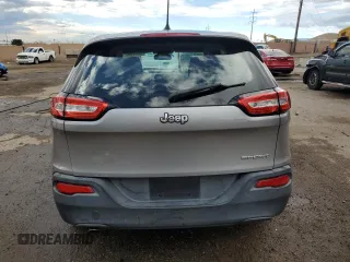 2015 Jeep Cherokee Sport z VIN 1C4PJLAB1FW711631, wystawiony jako Copart lot #58373145 z przebiegiem 123 683 mil mil oraz Szkoda całkowita • Salvage title. Historia ofert i sprzedaży dostępna na DreamBid. Obrazek 6.