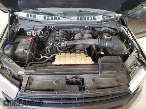 2018 Ford F-150 XL with VIN 1FTMF1EB4JKC19744, listed as a Copart auction lot 57333825 with 81,550 mi miles and Salvage title. Bid and sale history available at DreamBid. Image 11.