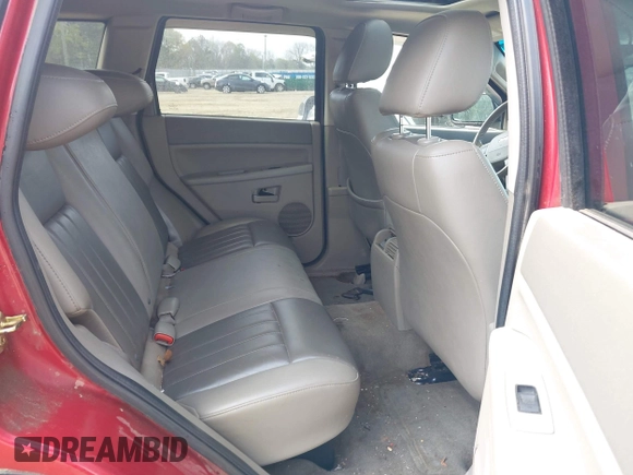 2005 Jeep Grand Cherokee Laredo with VIN 1J4HS48N95C711992, listed as a IAAI auction lot 41944696 with 209,299 mi miles and . Bid and sale history available at DreamBid. Image 8.