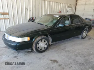 1999 Cadillac Seville Luxury SLS z VIN 1G6KS54Y5XU920020, wystawiony jako Copart lot #53956115 z przebiegiem 104 096 mil mil oraz Tytuł czysty. Historia ofert i sprzedaży dostępna na DreamBid. Obrazek 1.