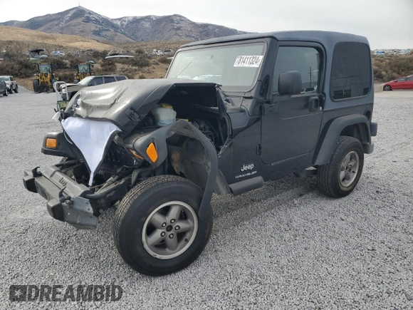 2003 Jeep Wrangler SE with VIN 1J4FA29113P351844, listed as a Copart auction lot 81411324 with 53,525 mi miles and Salvage title. Bid and sale history available at DreamBid. Image 1.