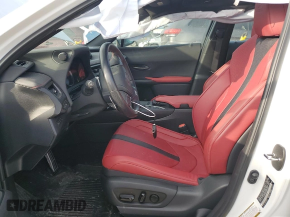 2021 Lexus UX with VIN JTHR9JBH2M2049747, listed as a Copart auction lot 43319555 with 22,606 mi miles and Salvage Title. Bid and sale history available at carsss.com. Image 7.