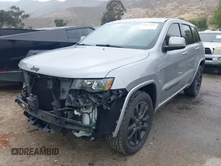 2017 Jeep Grand Cherokee Laredo with VIN 1C4RJEAG0HC702195, listed as a IAAI auction lot 42427597 with 104,403 mi miles and . Bid and sale history available at DreamBid. Image 2.
