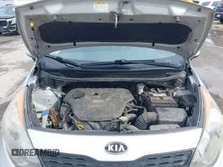 2012 Kia Rio LX with VIN KNADM5A36C6040934, listed as a IAAI auction lot 41970914 with 121,405 mi miles. Bid and sale history available at carsss.com. Image 10.