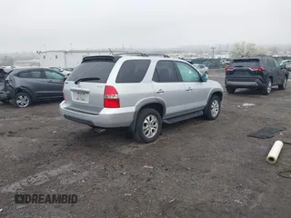 2003 Acura MDX Touring Pkg w/Navigation System with VIN 2HNYD18863H525646, listed as a IAAI auction lot 41951543 with 167,289 mi miles. Bid and sale history available at carsss.com. Image 4.